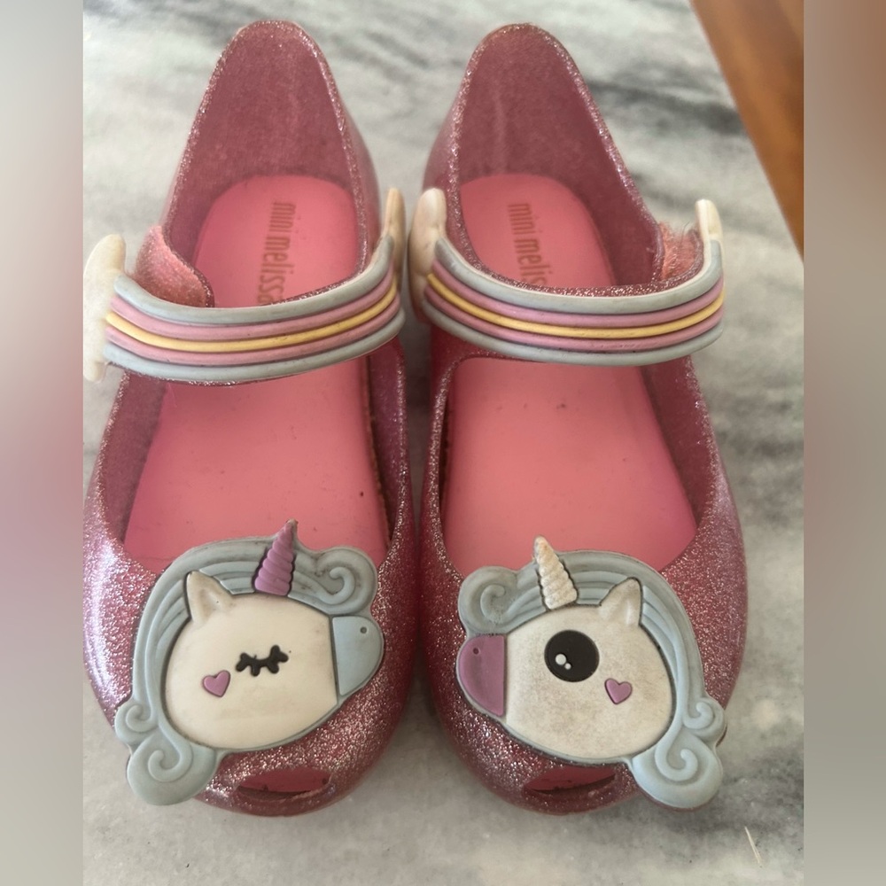 Mini Melissa unicorn sandals.